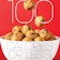 Garbanzo bean cookie dough bites falling into a white bowl that indicates "100 calorie or less desserts."