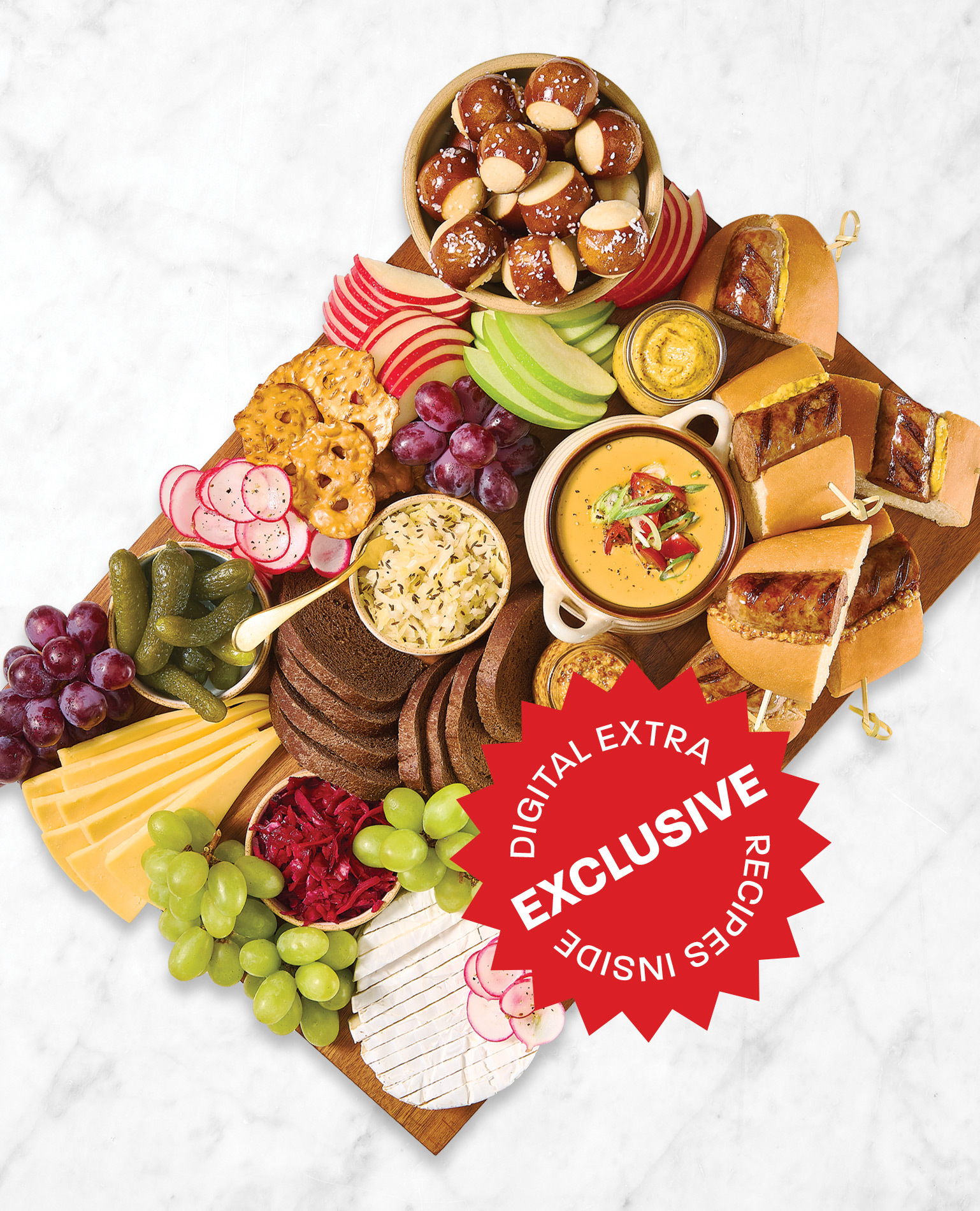 A grazing charcuterie board filled with Oktoberfest foods.