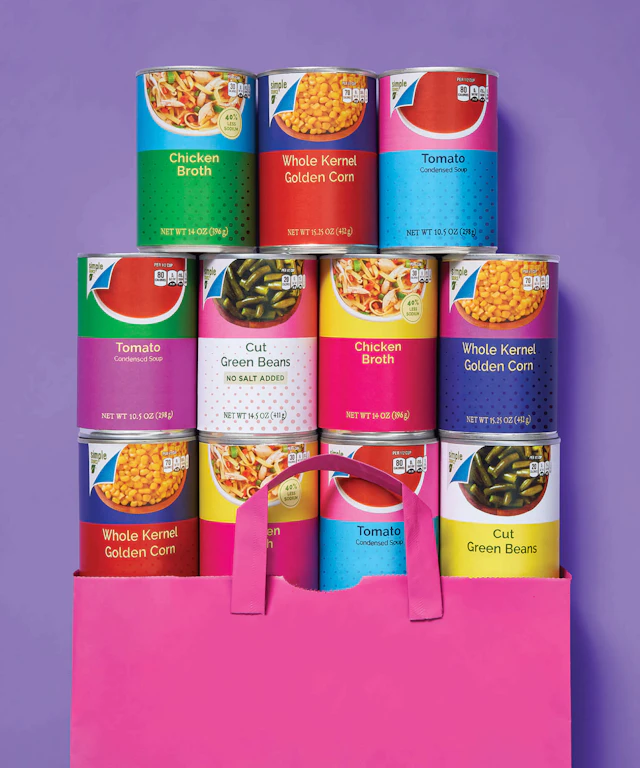 A stack of multicolored canned foods