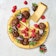A cheesecake topped with chocolate-covered strawberries and raspberries.