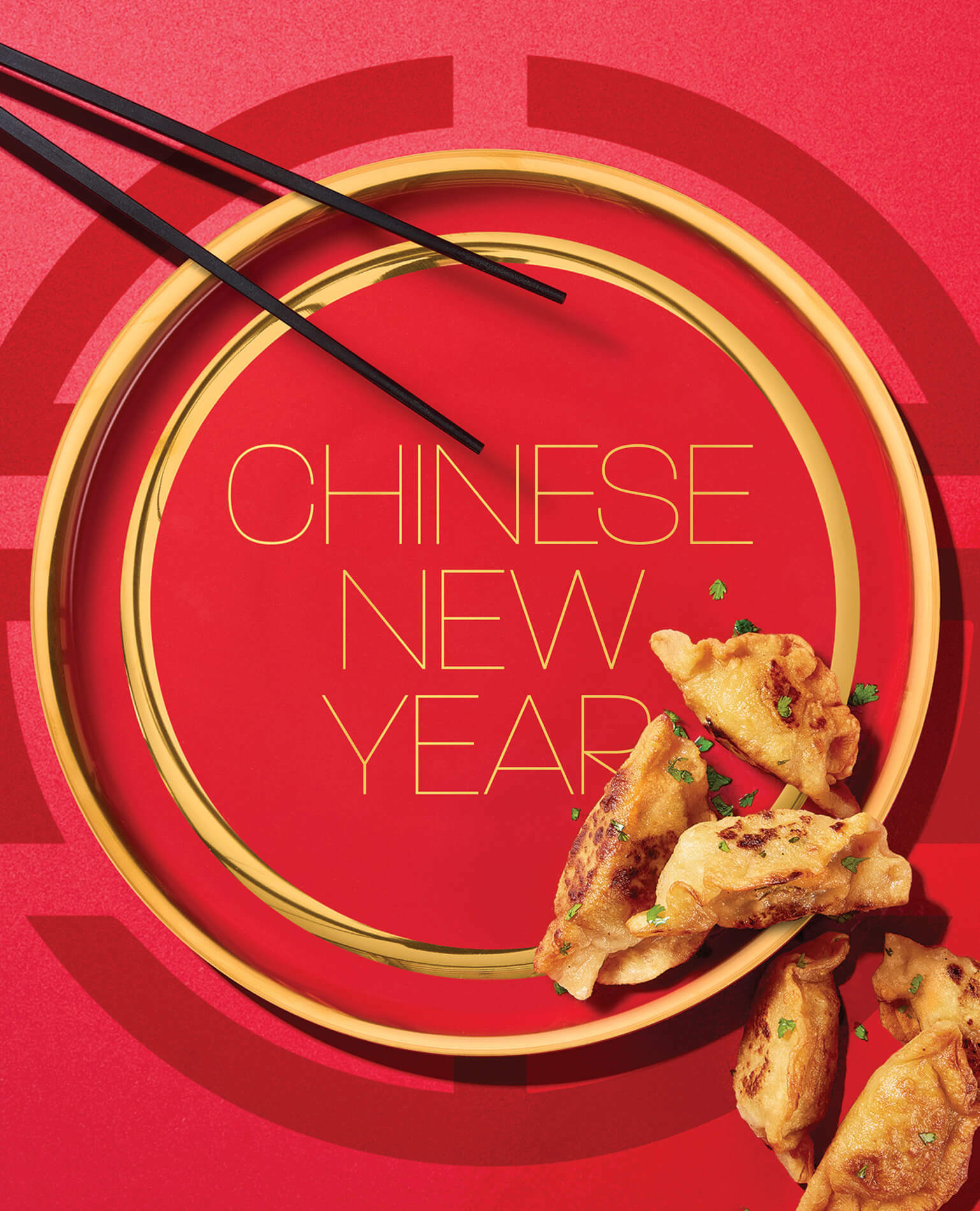 A plate, chopsticks, and dumplings celebrate the Chinese New Year.