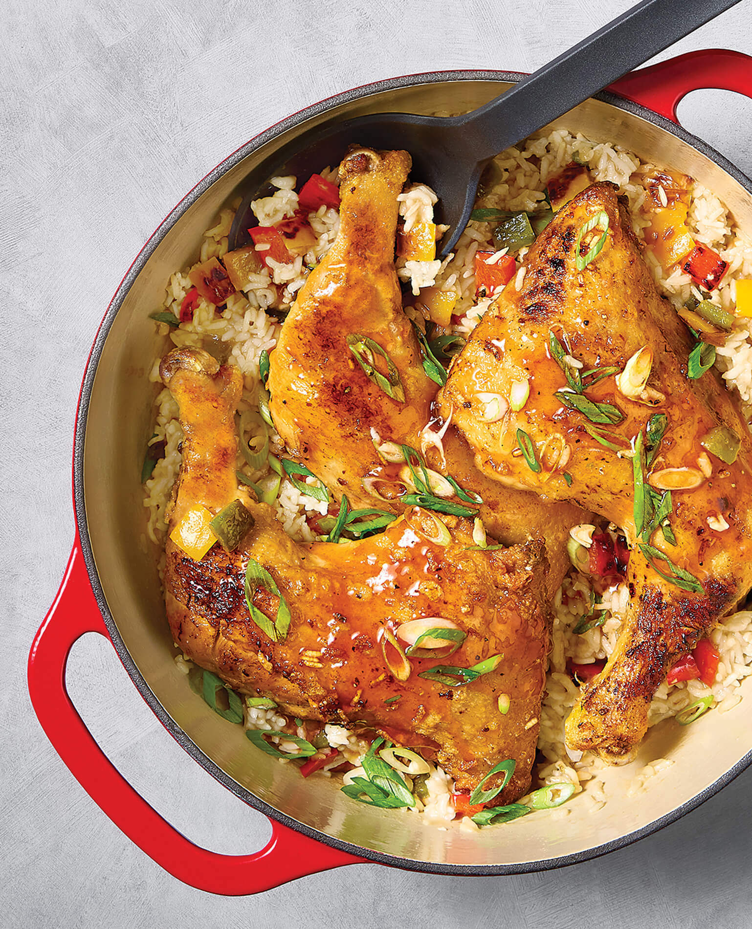 A Dutch oven filled with a homestyle chicken dinner.