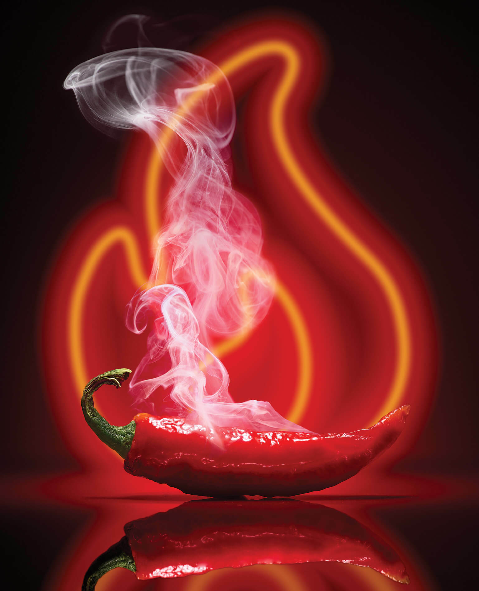 A red chile pepper smoking with a hot fire neon sign in the background.