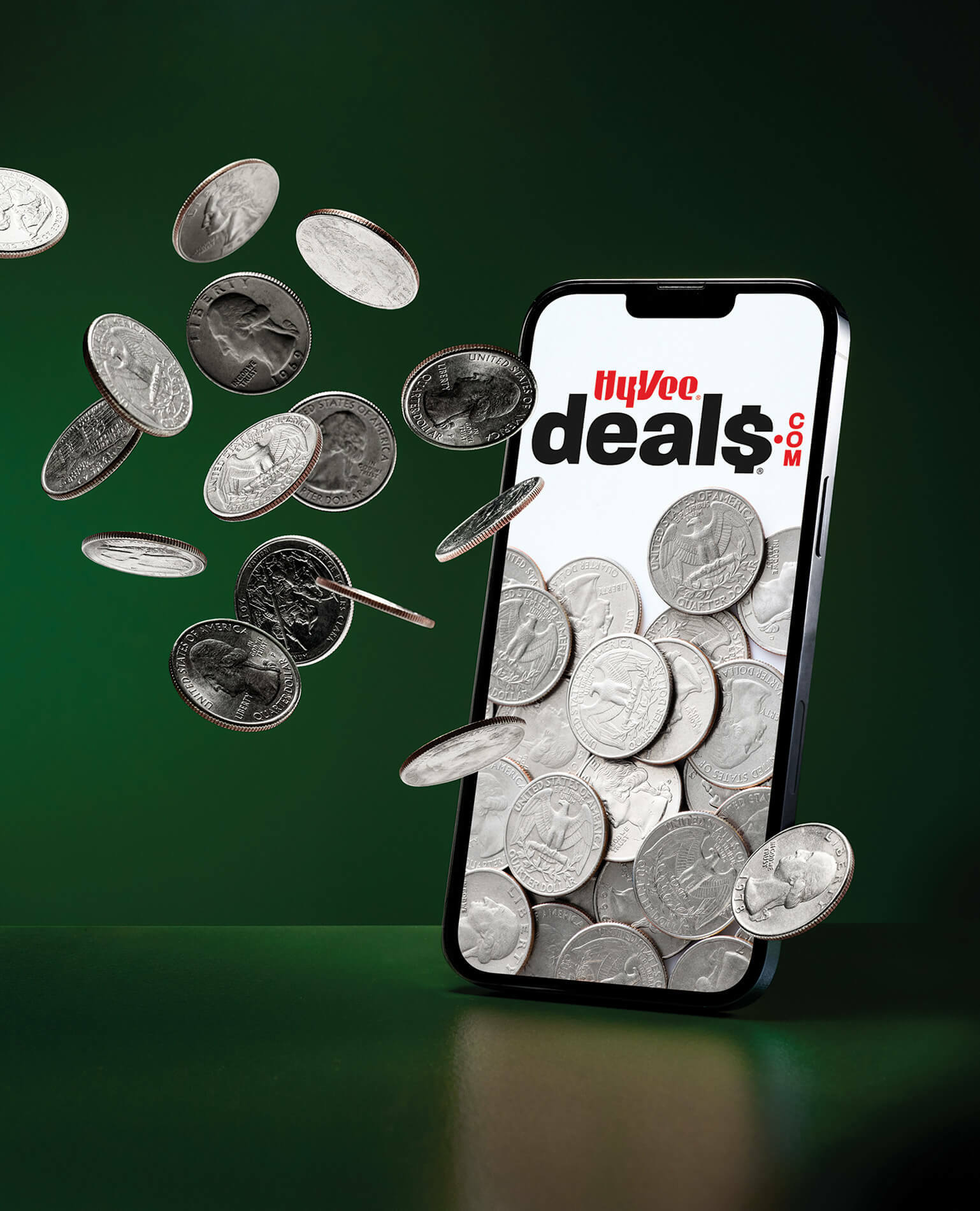 A mobile phone displaying Hy-Vee Deals.com graphics collecting coins.