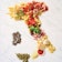 Foods of Italy put together to form the shape of the country of Italy.