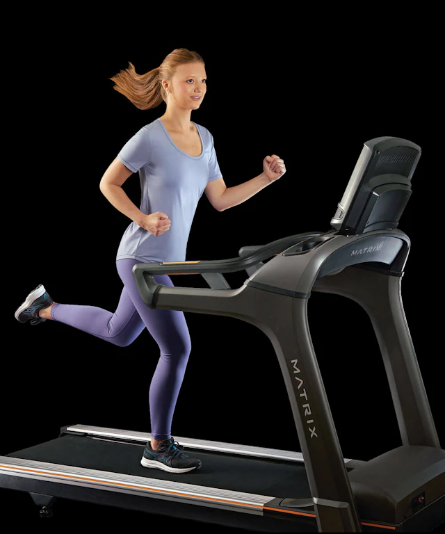 A woman running on a treadmill