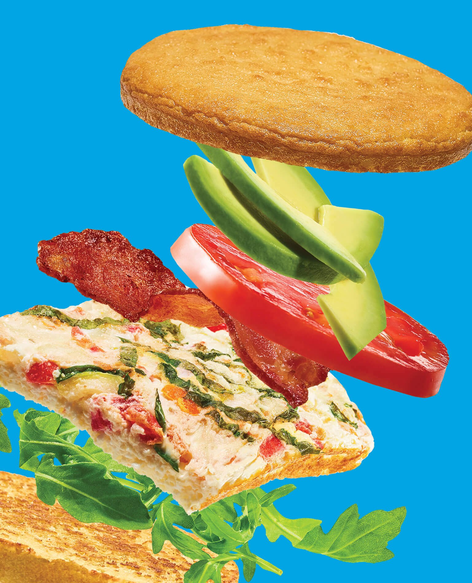 The toppings of a breakfast sandwich flying through the air.