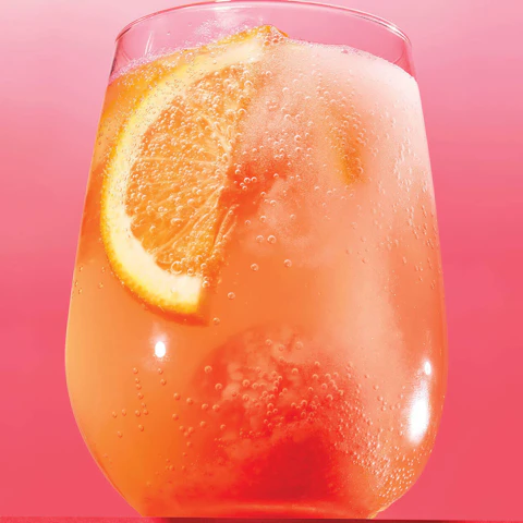 Glass of Tequila Sunrise Fizzy Bomb cocktail