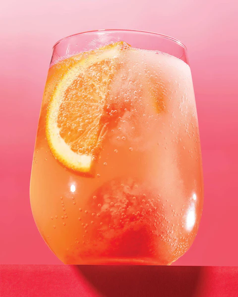 Glass of Tequila Sunrise Fizzy Bomb cocktail