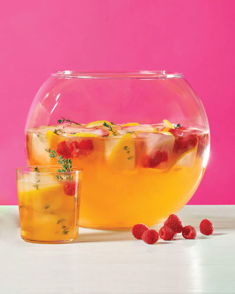 Punch bowl and glass of Peach Punch Cocktails