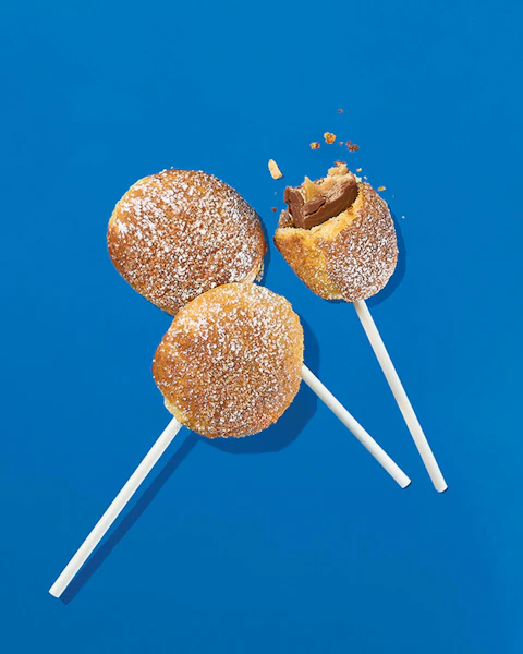 Three Air Fried Candy Bars on sticks