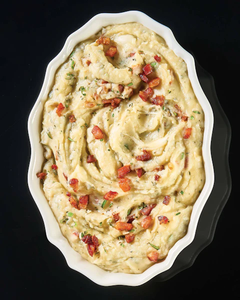 Serving bowl of Truffle Burrata Mashed Potatoes