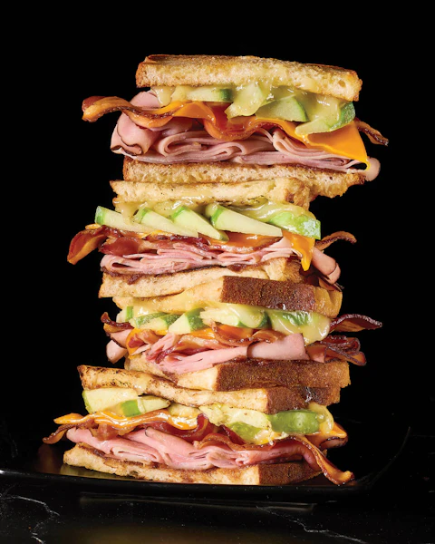 A stack of Cheesy Apple Ham Melt sandwiches