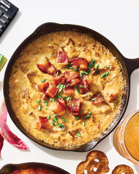 A skillet of Caramelized Onion Bacon Dip