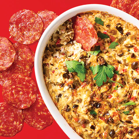 Bowl of Salami Chips with Muffuletta Dip