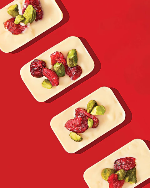 A row of Ice Cube Tray White Chocolates