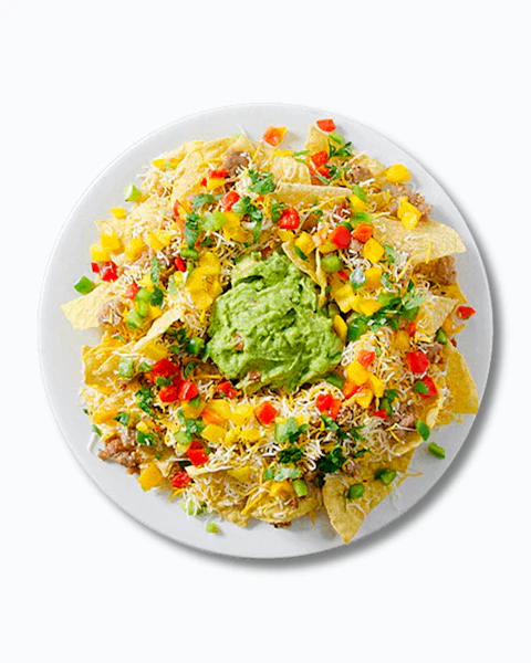 Plate of bratwurst nachos, also known as brat-chos.