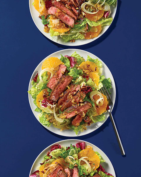 Plates of Citrus Beef salad