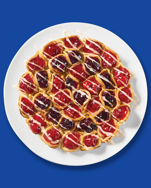 Blueberry Cherry Pull Apart Pie on a blue background