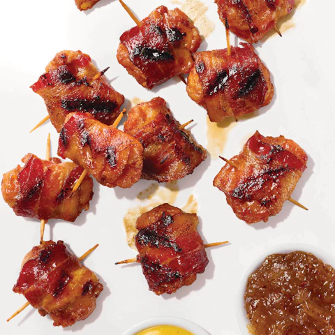 Grilled Bacon Wrapped Chicken Bites on toothpick skewers