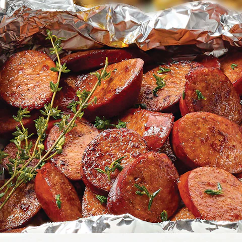 Chunks of Red Wine Grilled Chorizo in tin foil