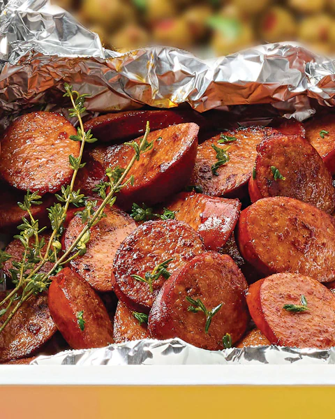 Chunks of Red Wine Grilled Chorizo in tin foil