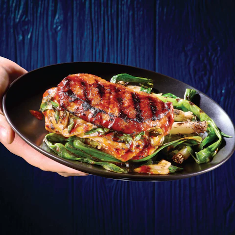 Grilled Kimchi Stuffed Pork Chops on a plate