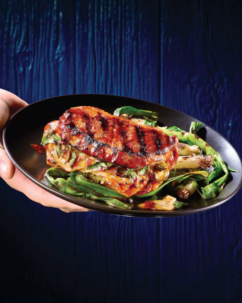 Grilled Kimchi Stuffed Pork Chops on a plate