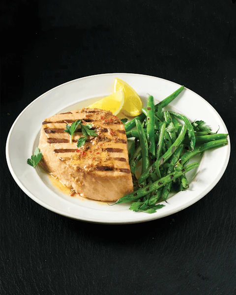 Plate of Smoky Tuna Steaks with Lemon Pepper Sauce