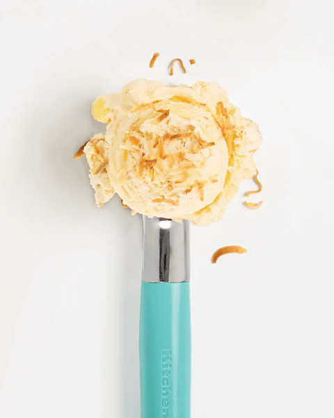 A single scoop of No Churn Pineapple Mint Ice Cream