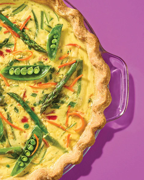 A baking dish of Gluten Free Quiche with Spring Vegetables.