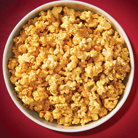 A bowl of spicy Buffalo Style Popcorn.