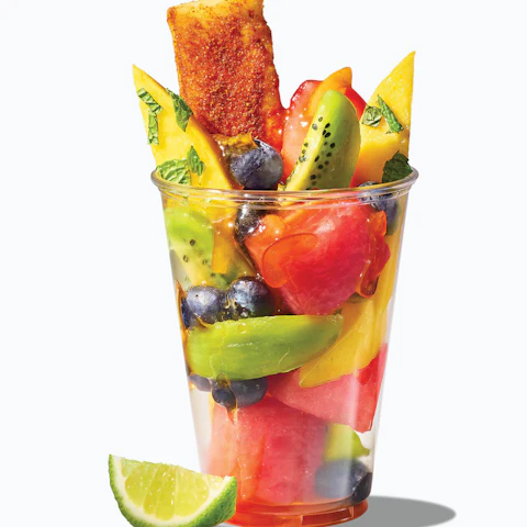 Cup filled with a colorful and Spicy Fruit Salad.