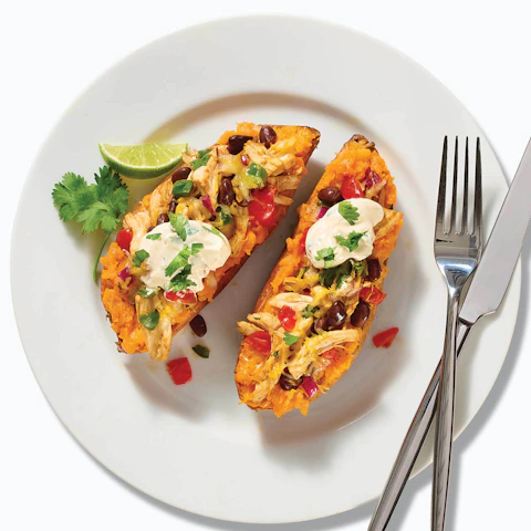 A plate of Mexican Chicken Stuffed Sweet Potatoes