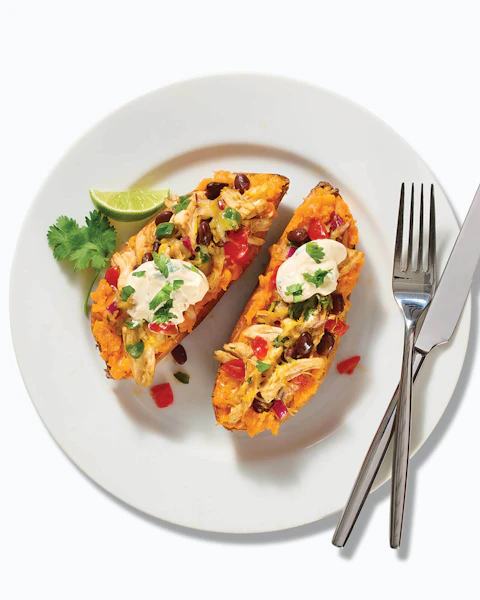 A plate of Mexican Chicken Stuffed Sweet Potatoes