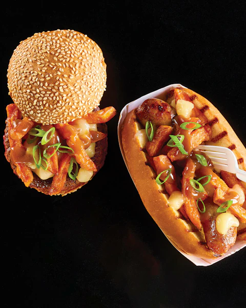 Poutine Burger and Brat on a black background.