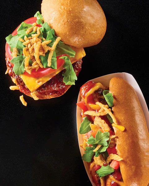 Sweet Heat BBQ Burger and Brat on a black background.