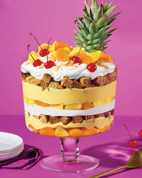 Serving bowl of a layered Tropical Pina Colada Trifle dessert.