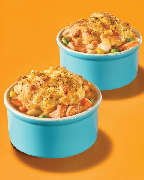 Two ramekins of Butter Biscuit Seafood Pot Pie