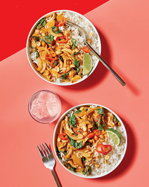 Two bowls of Chicken with Peanut Coconut Curry