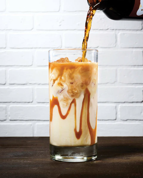 A glass of Iced Caramel Macchiato.
