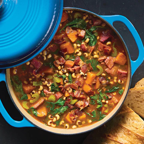 A Dutch oven filled with Smoky Black Eyed Pea Soup