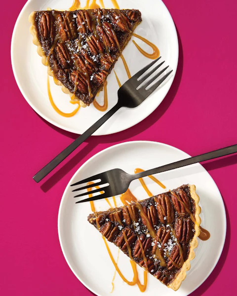 Two plates of Gluten Free Cold Brew and Coffee Liqueur Pecan Pie with forks