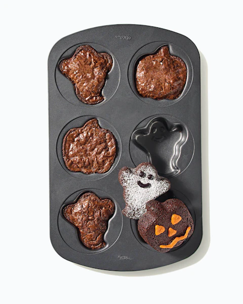 Brownies molded into Halloween shapes like ghosts and jack-o-lanterns