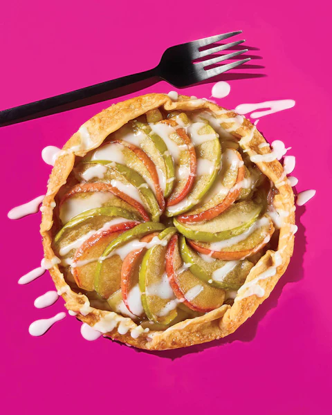 Mini Apple Crostata on a pink background