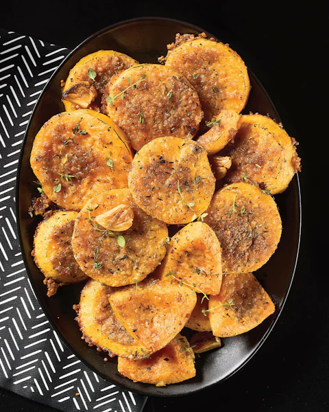 Plate of sliced Garlic Parmesan Butternut Squash