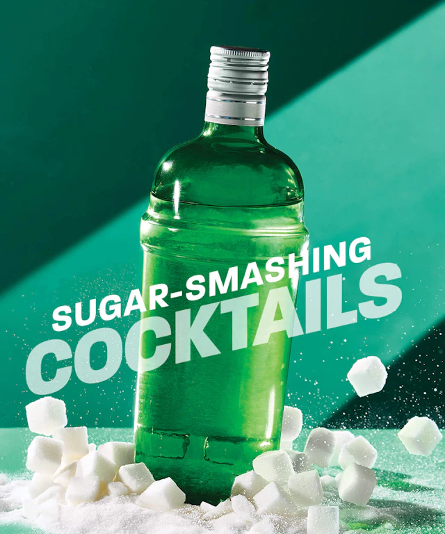 A green liquor bottle smashing sugar cubes