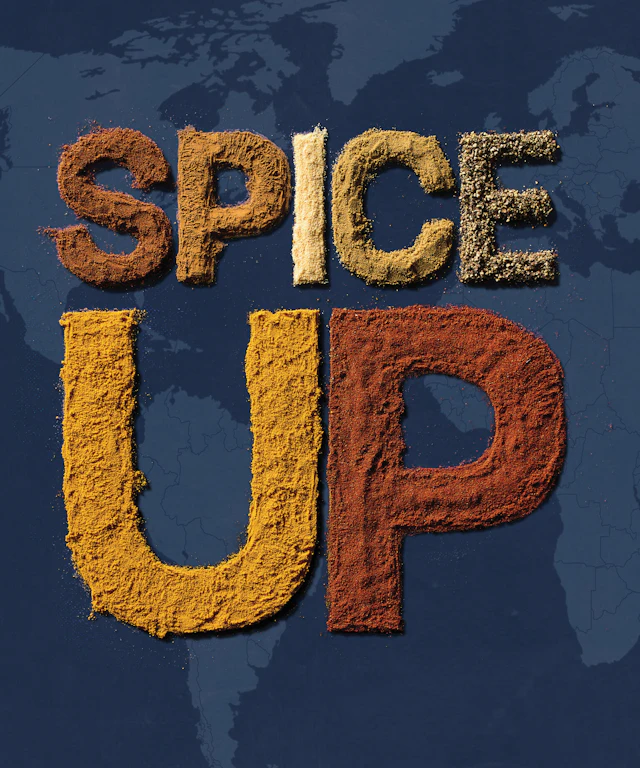 Various spices formed to create the words Spice Up on top of world map